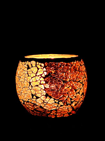 Glowing Mosaic Candle Holder on Black Background