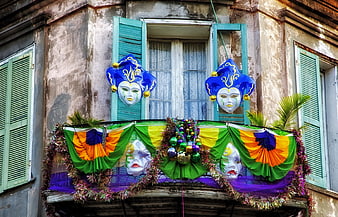 Mardi Gras Masks And Banners On French Quarter Balcony