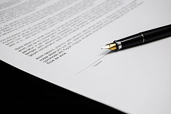 Fountain pen on contract document ready for signature