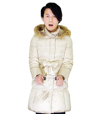 Man in beige down jacket with handcuffs on white background