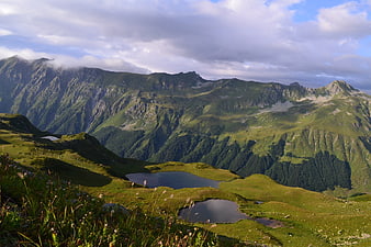 Scenic Alpine Landscape with Mountain Lakes and Green Valleys