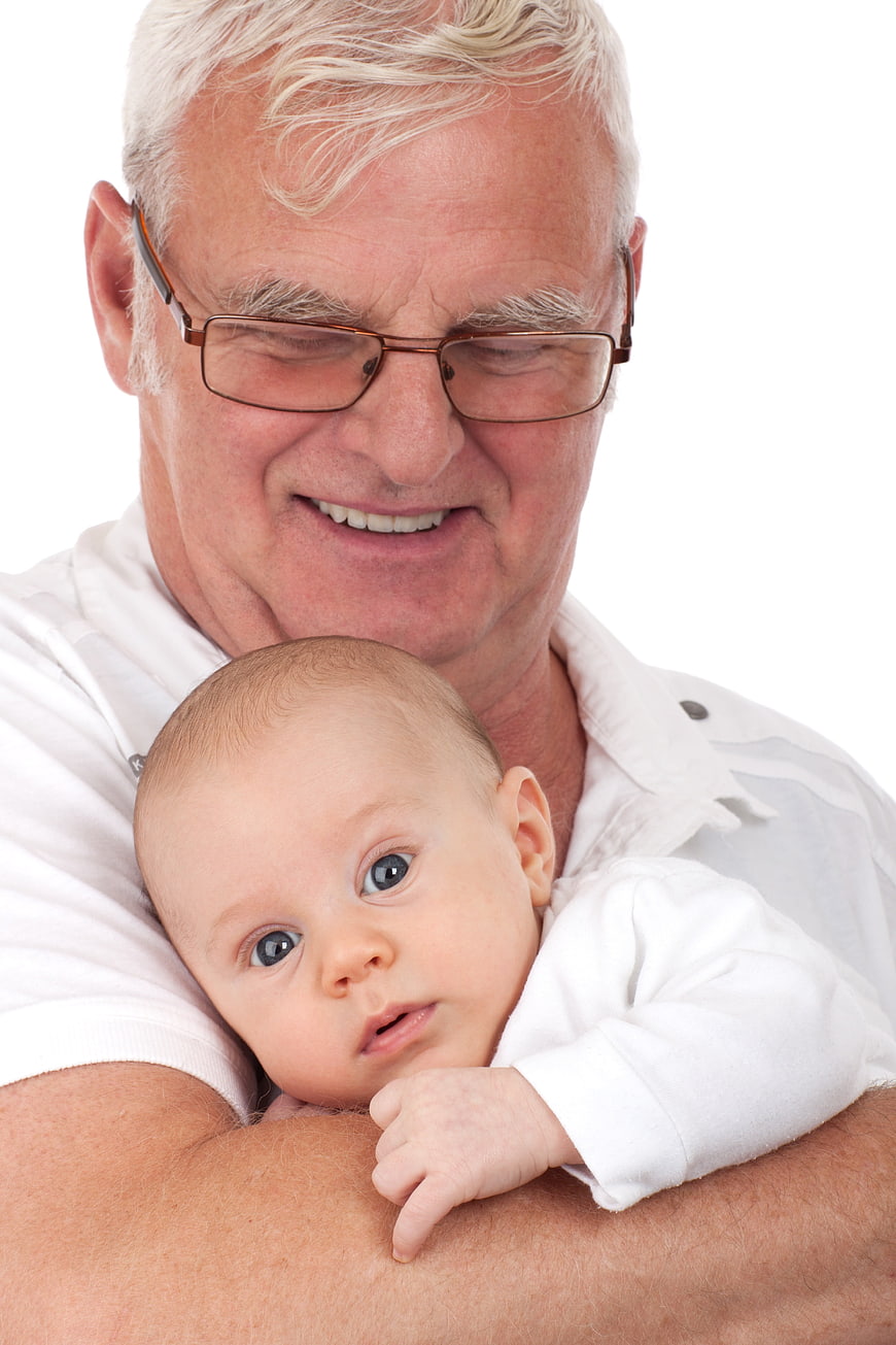 Senior Grandfather Holding Baby Boy Portrait