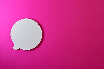 White paper speech bubble on vibrant pink background