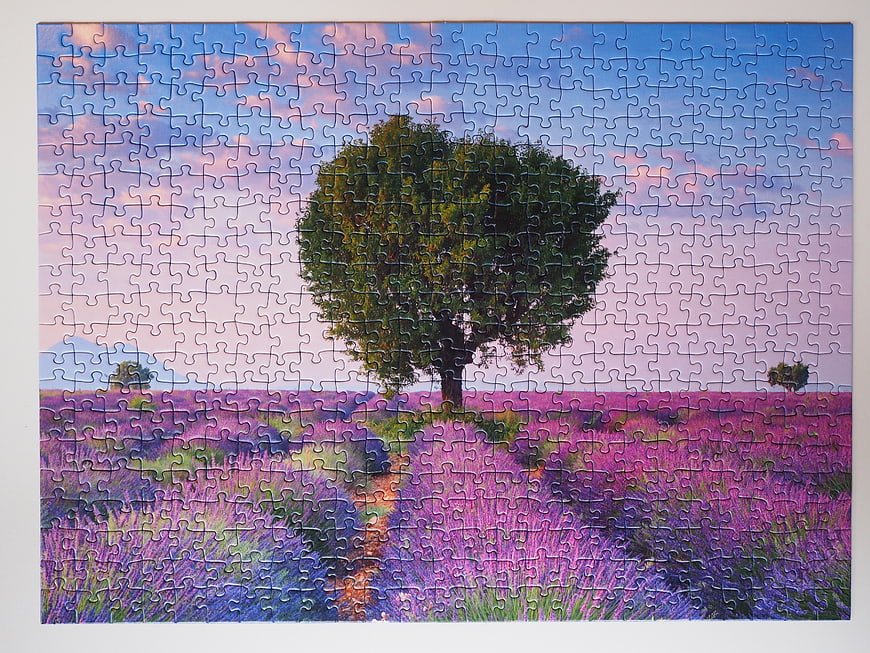 Completed Jigsaw Puzzle Featuring Lavender Field and Tree