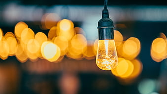 Vintage Edison Light Bulb with Bokeh Background
