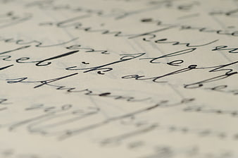 Close-up of elegant handwritten calligraphy on paper