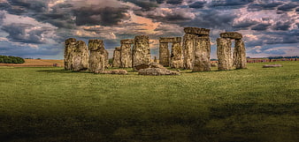 Stonehenge monument under dramatic cloudy sky