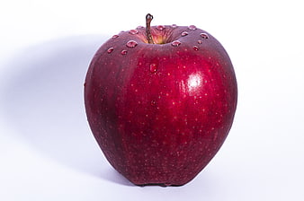 Fresh Red Apple with Water Droplets on White Background
