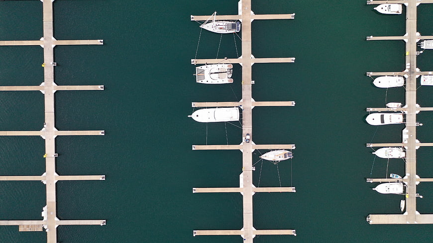 Aerial Top View of Boats Docked at Marina