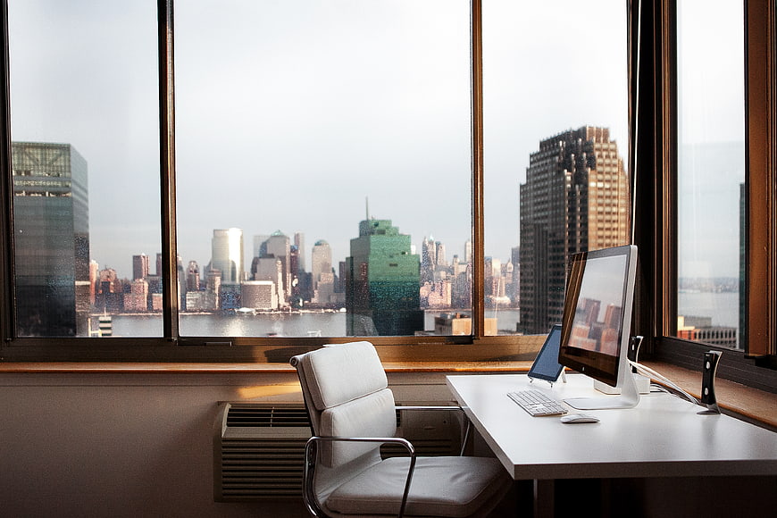 Modern Home Office with City Skyline View