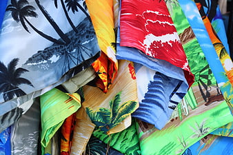 Colorful tropical patterned shirts and fabrics