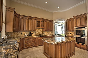 Luxury Kitchen With Wooden Cabinets And Granite Countertops