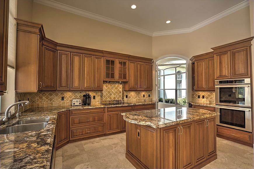 Luxury Kitchen With Wooden Cabinets And Granite Countertops