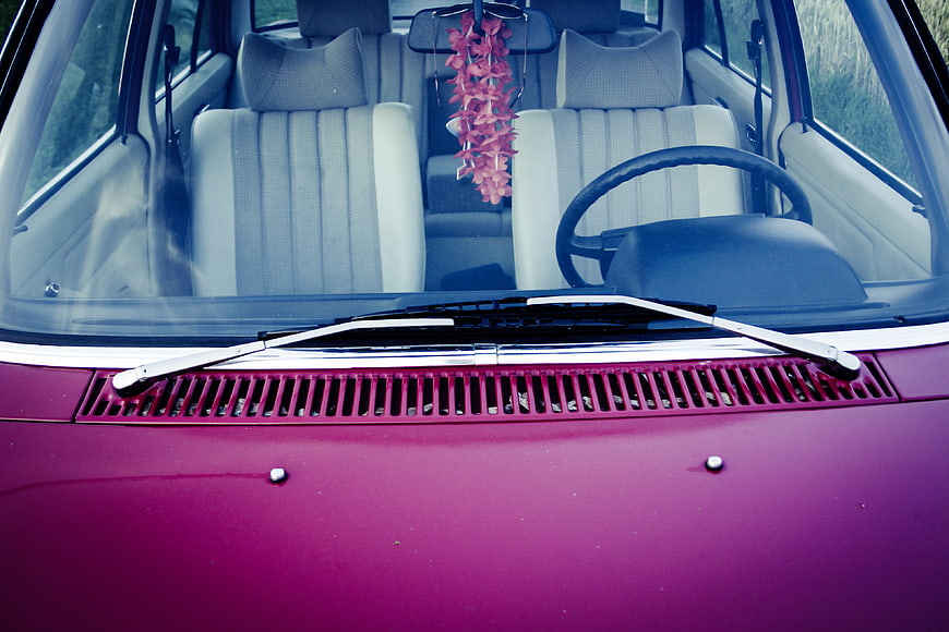 Vintage Pink Car Interior with Flower Air Freshener