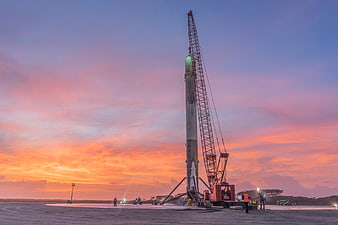 SpaceX Falcon 9 Rocket Landing at Sunset
