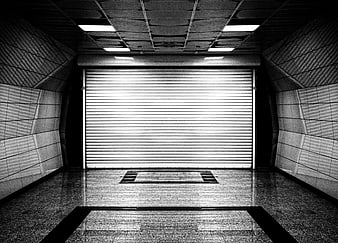 Symmetrical Black and White View of Closed Metal Garage Door