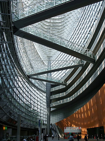 Modern Glass Atrium with Curved Architecture and Steel Beams