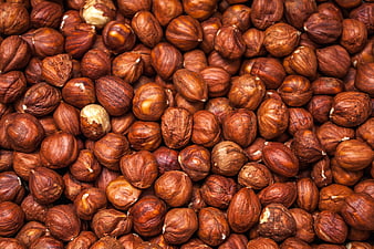 Close-up texture of roasted hazelnuts background