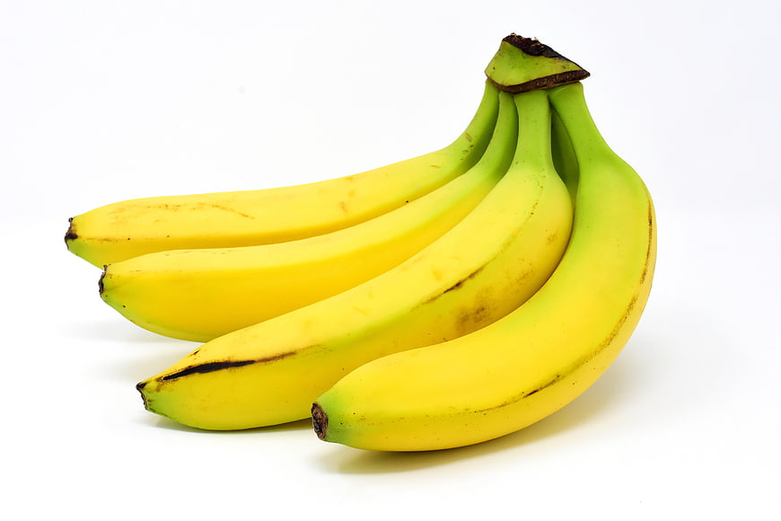 Bunch of Ripe Yellow Bananas Isolated on White Background