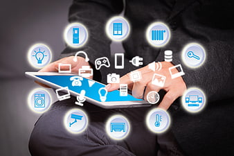 Person Using Tablet With Smart Home Technology Icons