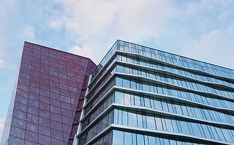 Modern Glass Office Buildings with Red and Blue Facades