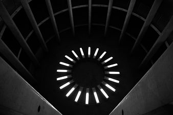 Black and white spiral parking garage lights