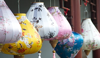 Colorful Asian Paper Lanterns Hanging in a Row