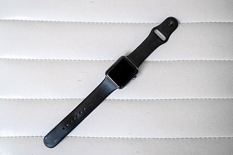 Black Smartwatch on White Leather Background