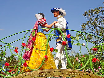 Snow White and Prince Charming on a parade float