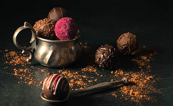 Gourmet Chocolate Truffles in Vintage Silver Cup with Cocoa Powder
