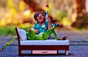 Cute Nurse Figurine Holding Syringe with Frog Patient on Miniature Bed