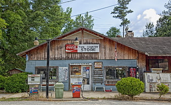 Rustic Country Store With Vintage Gas Pumps In Rural Alabama