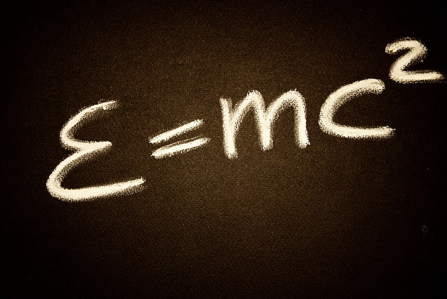 E=mc2 Formula Written in Chalk on Blackboard