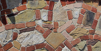 Textured stone and brick wall pattern background