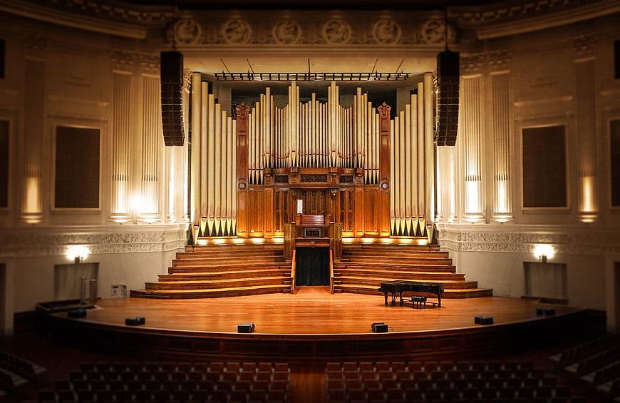 Grand Pipe Organ on Empty Concert Hall Stage