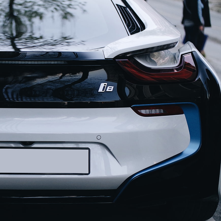 Close-up of white BMW i8 rear taillight and bumper