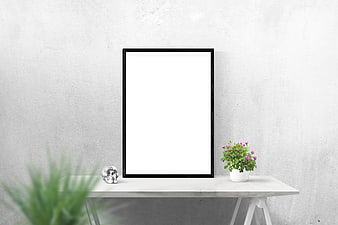 Minimalist black picture frame mockup on white console table