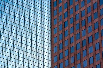Abstract Modern Architecture with Glass and Brick Facades
