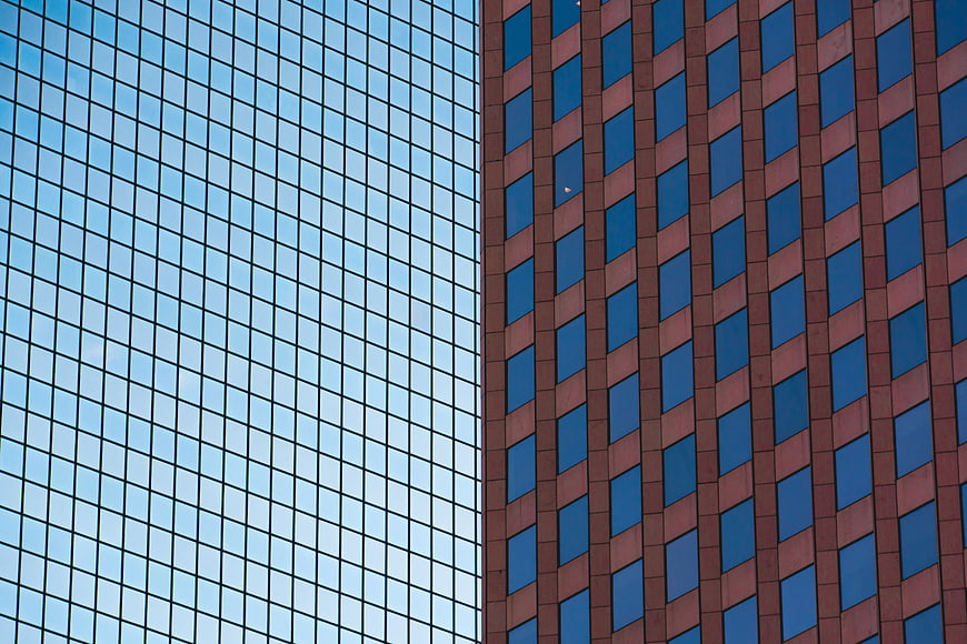 Abstract Modern Architecture with Glass and Brick Facades