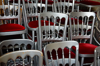 Stacked Silver Chiavari Chairs with Red Velvet Seats