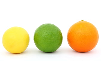 Lemon, Lime, and Orange Arranged in a Row on White Background
