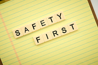 Safety First Scrabble Tiles on Yellow Notebook Paper
