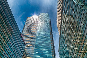Low angle view of modern glass skyscrapers in Tokyo, Japan