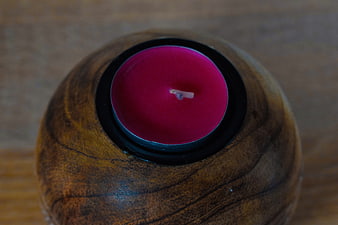 Top View of Pink Tea Light Candle in Wooden Holder