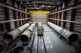 SpaceX rocket boosters in assembly hangar