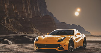 Orange Ferrari 812 Superfast parked in a dramatic desert canyon landscape
