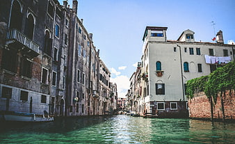 Venice Canal with Historic Buildings and Laundry