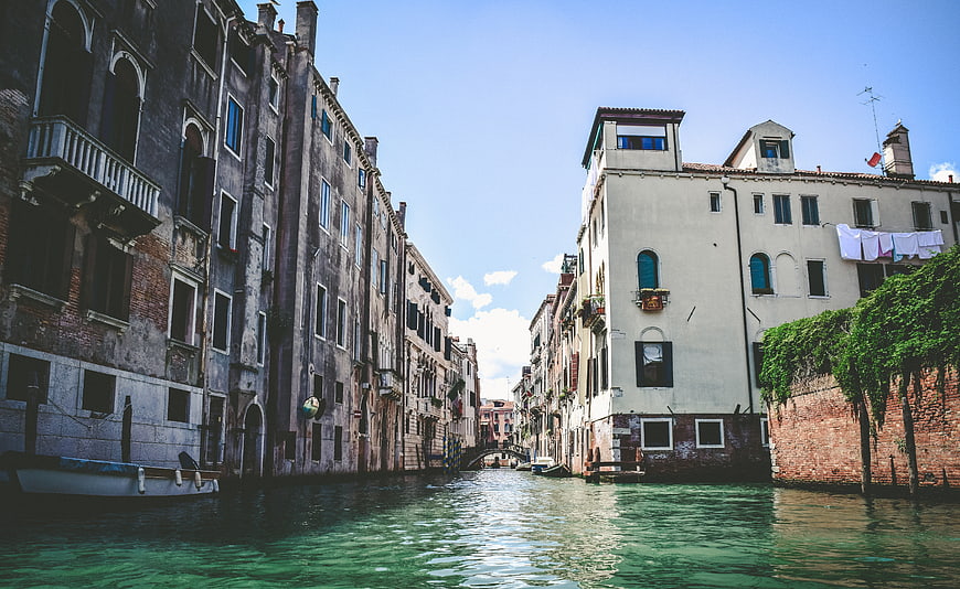 Venice Canal with Historic Buildings and Laundry