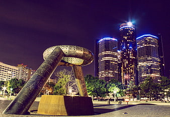 Detroit City Skyline At Night With Public Sculpture