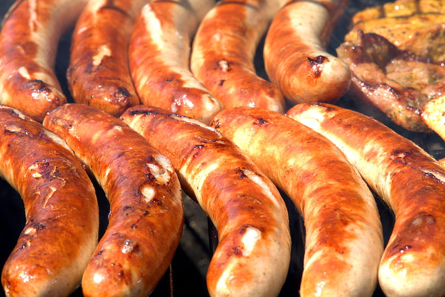 Grilled Sausages Close Up On Barbecue Grill